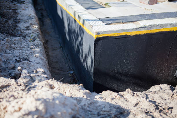 Professional Waterproofing technician working in Axis, AL